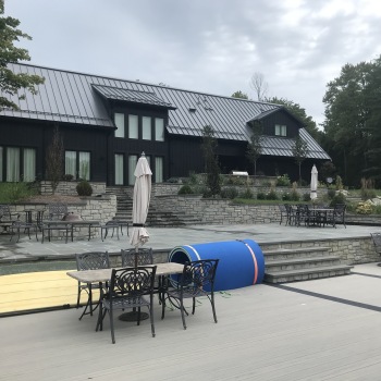 back of lakehouse with patio